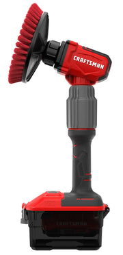 A cordless power scrubber tool with a red and black handle, gray grip, and a round red brush head. The word 'Craftsman' is printed on the side of the tool.