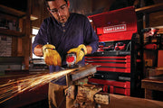 Photo of Craftsman CMEG200 angle grinder in use, sparks flying, red tool chest visible in workshop background.