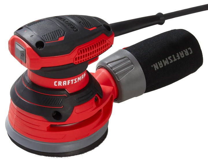 Craftsman CMEW231 red and black random orbital sander with dust collection, side angle photo.