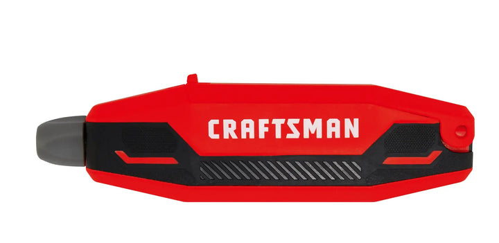 Photo of Craftsman red and black multi-bit screwdriver CMHT26023, side view on white background.