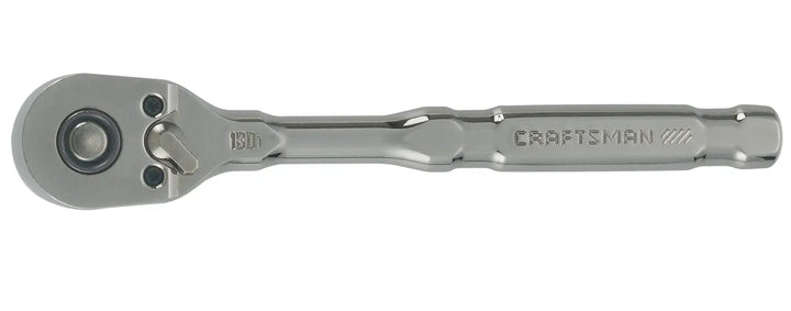 A metallic ratchet wrench with a textured handle and the brand name 'Craftsman' engraved on the side, viewed from above on a white background.