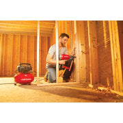 Photo of Craftsman air compressor CMP21PL in use at a wood framing construction site.