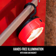 Craftsman red LED work light CMST98187 with hook and magnet hanging on metal rod.